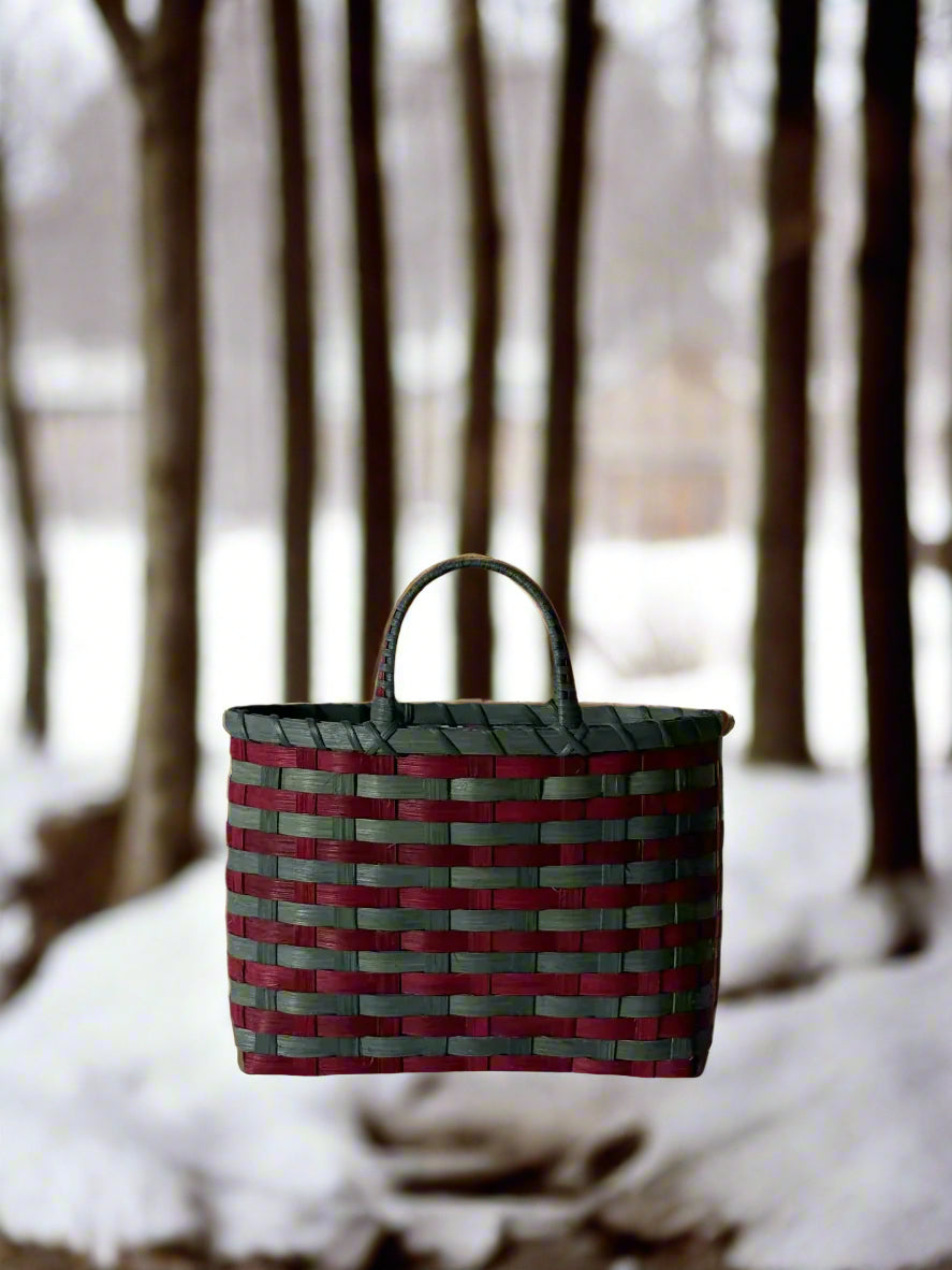 Woven basket on a table with a wooden wall background