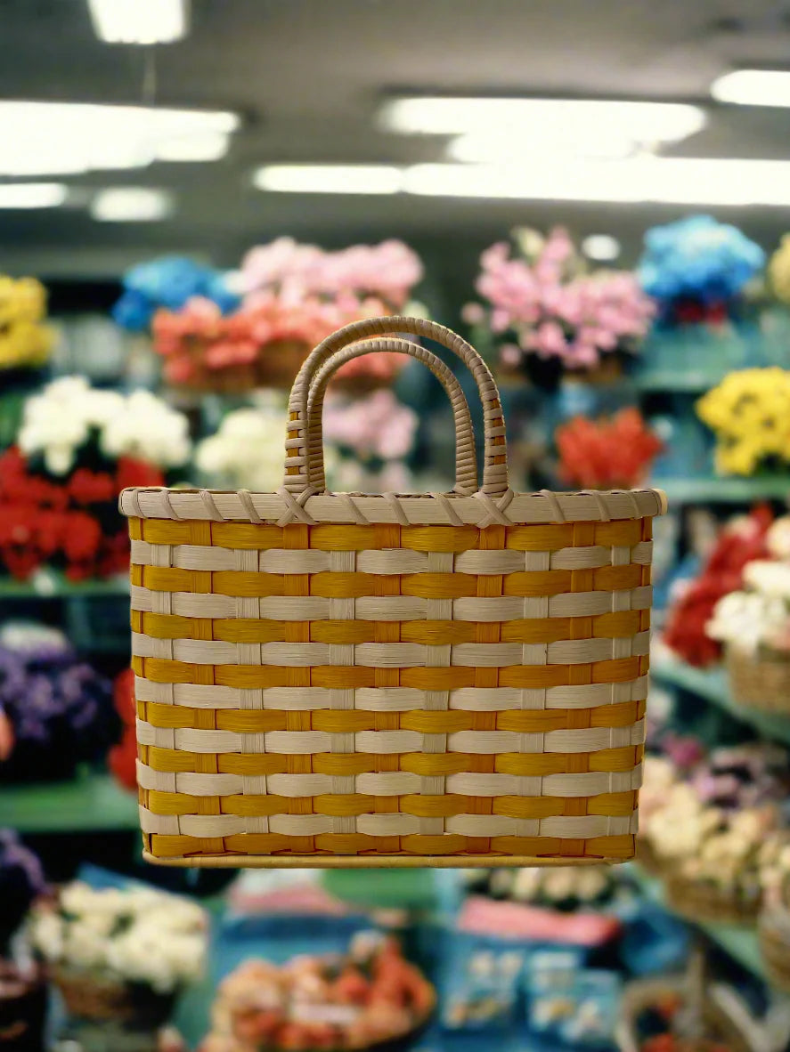 Woven basket with a blurred flower shop background